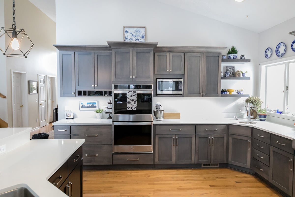 Kitchen wall with built-in oven and microwave in Cascade remodel by Ridgewood Home Construction