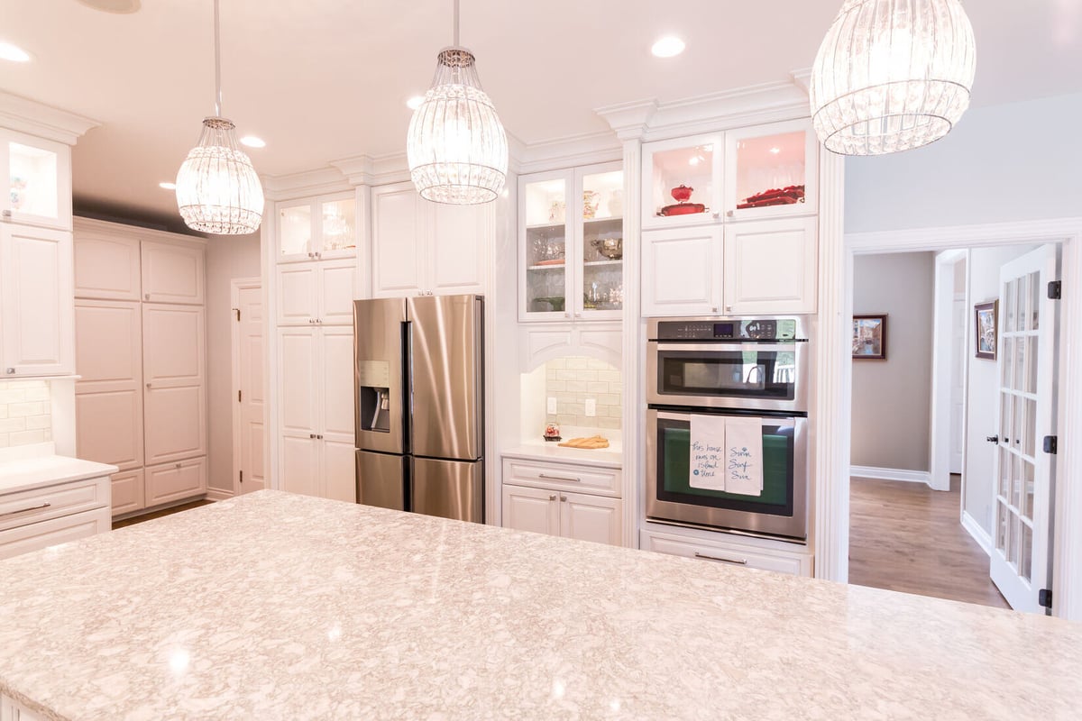Kitchen remodel with stainless double oven and French door refrigerator by Ridgewood Home Construction in Grand Rapids Township