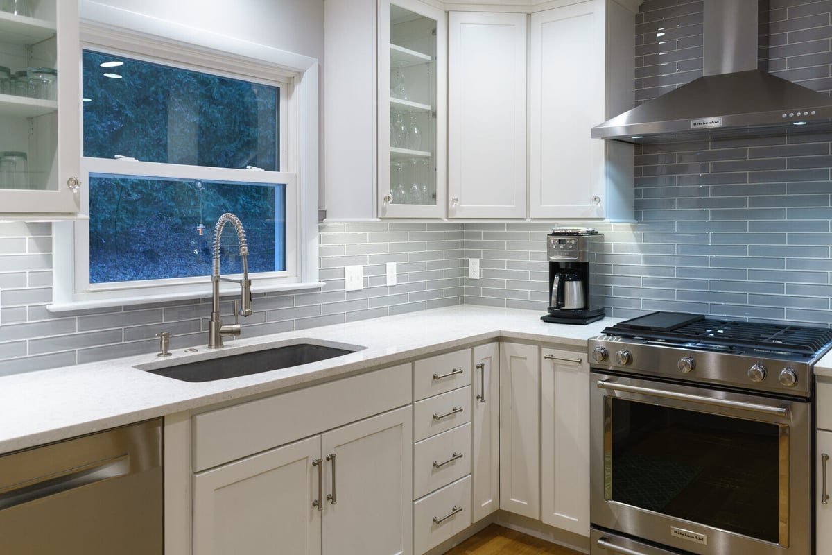 Rockford, MI kitchen remodel by Ridgewood Home Construction with large window and stainless sink